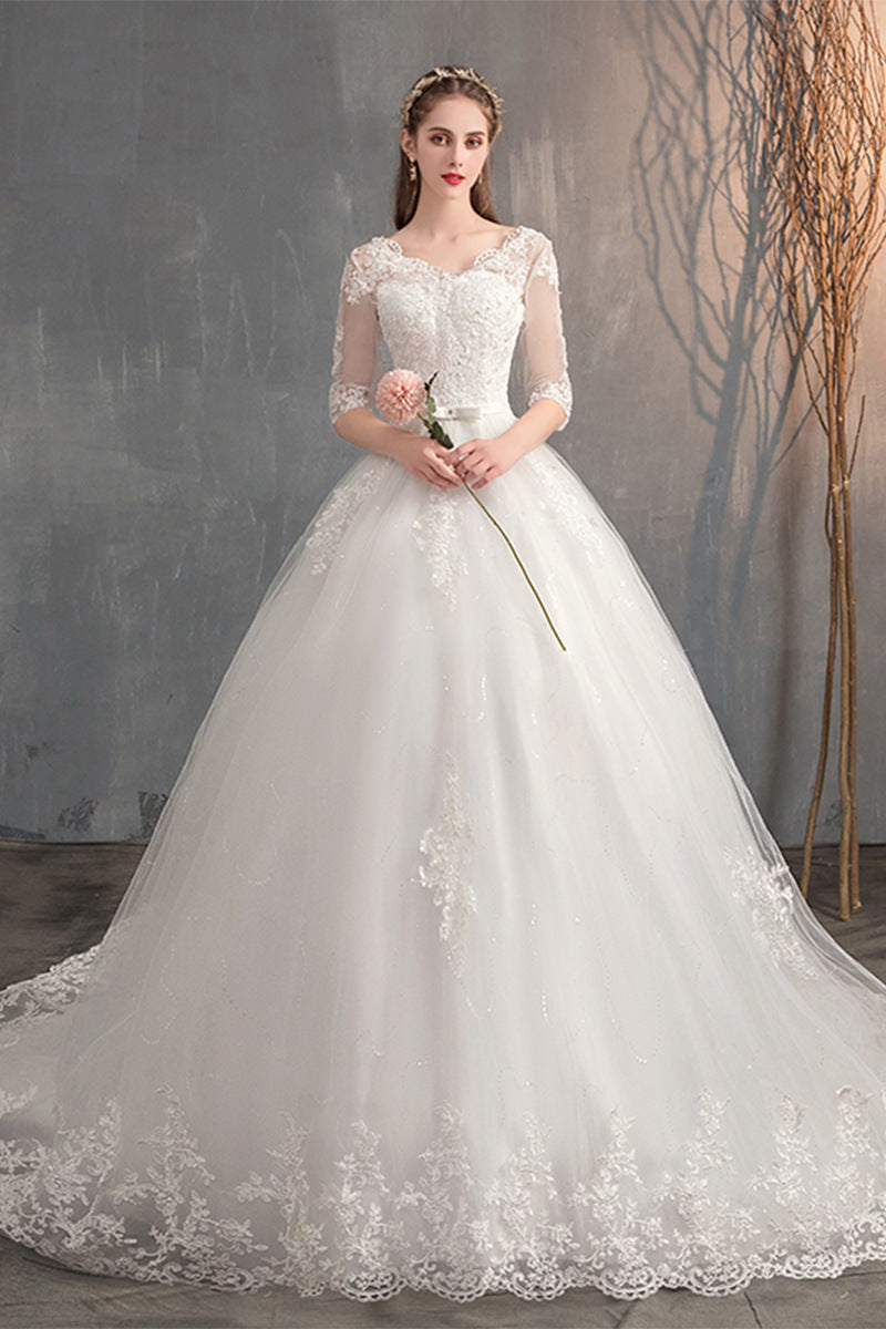 Romantic Floral Lace Appliqué A-Line Wedding Dress with Tulle Skirt.