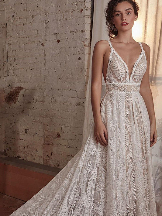 Boho Geometric Lace Wedding Dress - Elegant Long Sleeve Bridal Gown with Train.