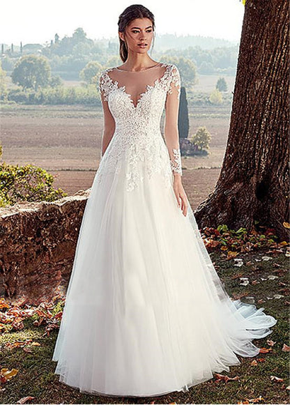Elegant Illusion Long Sleeve Lace Wedding Dress with Cathedral Train.