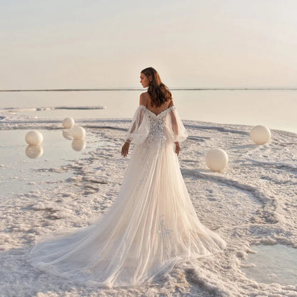 Boho Off-the-Shoulder Tulle Wedding Dress with Detachable Puff Sleeves.