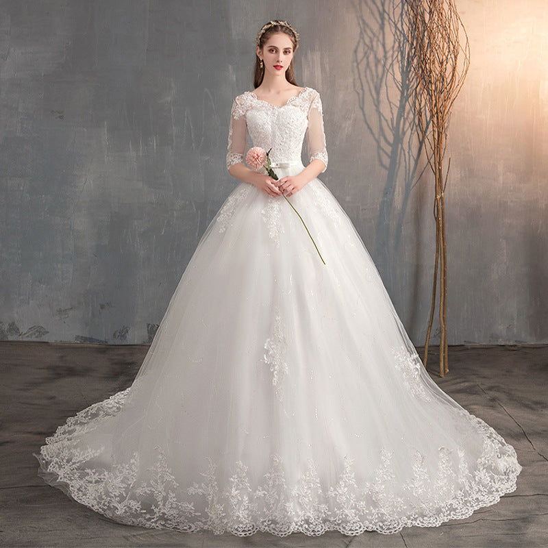 Romantic Floral Lace Appliqué A-Line Wedding Dress with Tulle Skirt.