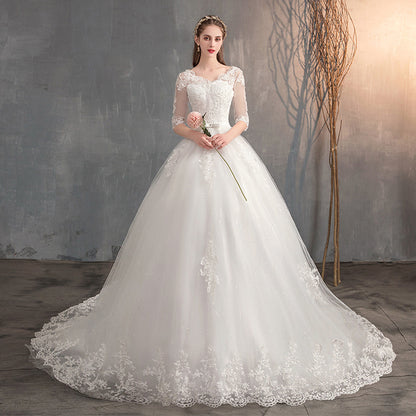 Romantic Floral Lace Appliqué A-Line Wedding Dress with Tulle Skirt.