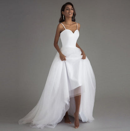 Simple Sweetheart Tulle A-Line Wedding Dress with High-Low Train.