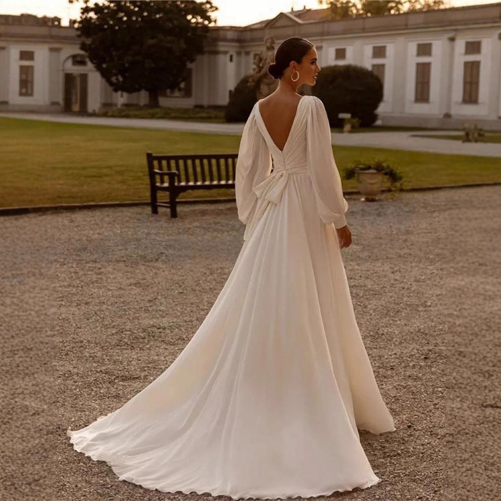 Elegant Long Sleeve Chiffon Wedding Dress - Deep V-Neck A-Line Bridal Gown.