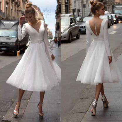 Boho Off-the-Shoulder Long Sleeve Tulle Wedding Dress with Lace Bodice.