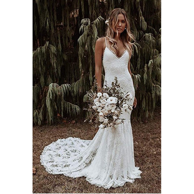 Boho Lace Mermaid Wedding Dress with Spaghetti Straps and Low Back.