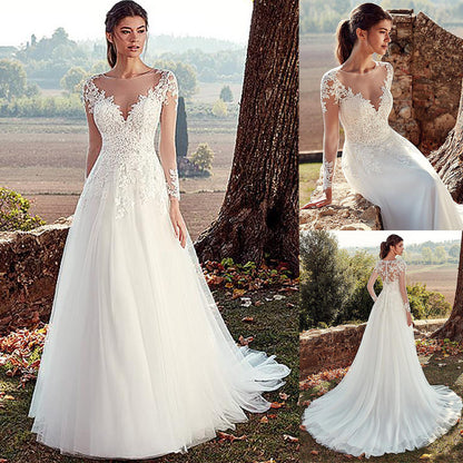 Elegant Illusion Long Sleeve Lace Wedding Dress with Cathedral Train.