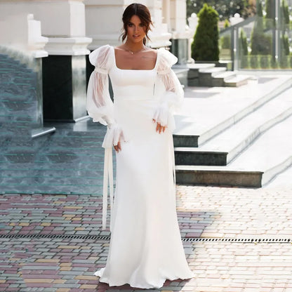 Elegant Off-the-Shoulder Lace Long Sleeve Mermaid Wedding Dress.
