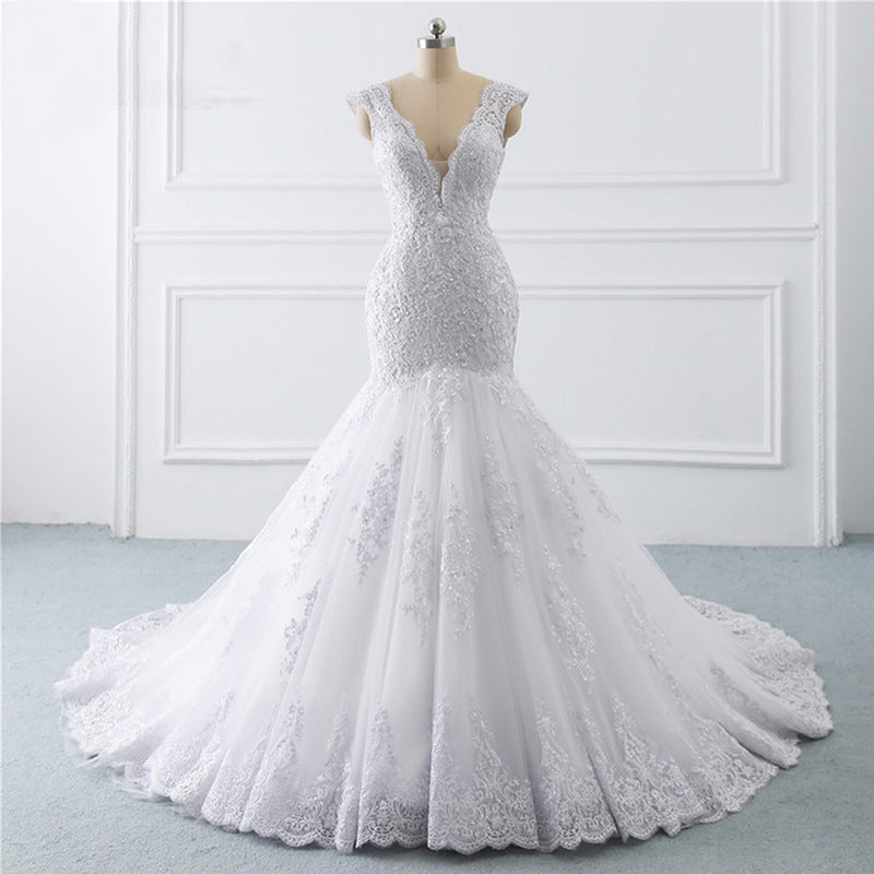 French Lace Mermaid Wedding Dress with Deep V-Neck and Long Train.