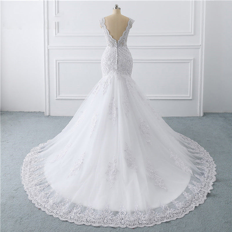 French Lace Mermaid Wedding Dress with Deep V-Neck and Long Train.