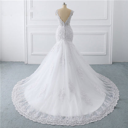 French Lace Mermaid Wedding Dress with Deep V-Neck and Long Train.