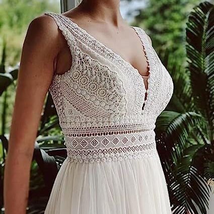 Ivory A-Line Chiffon Wedding Dress with V-Neck and Long Sleeves.
