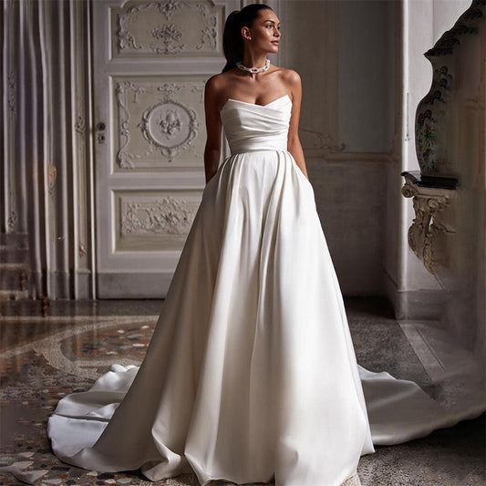 Minimalist Strapless Satin A-Line Wedding Dress with Train.