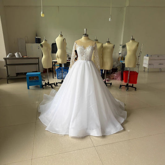 Off-Shoulder Embroidered Long Sleeve Wedding Dress with Train – Elegant Ball Gown Bridal Gown.