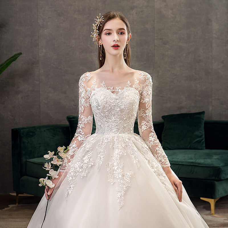 Long Sleeve Lace Backless Wedding Dress with Train – Elegant Ball Gown Bridal Gown.